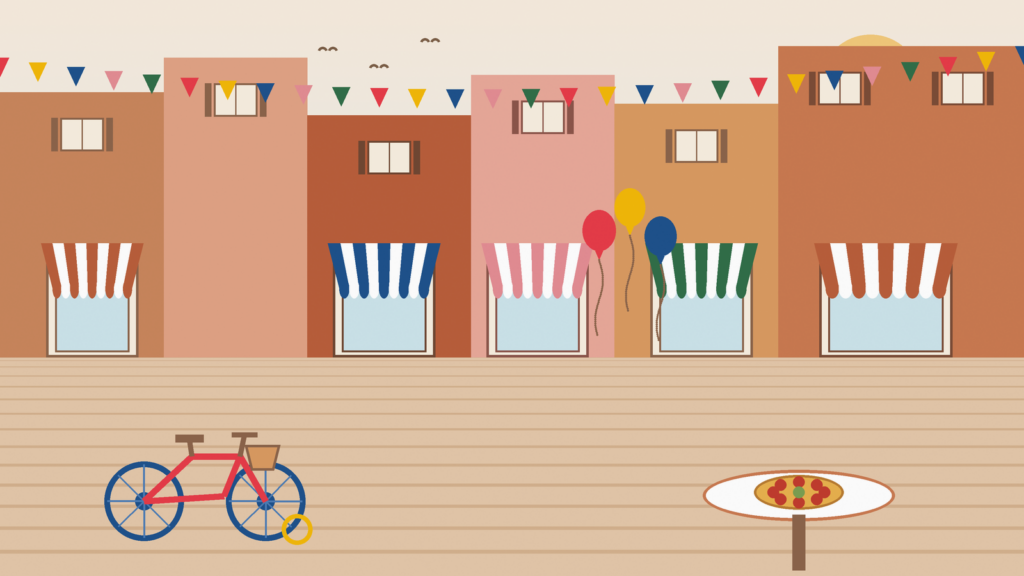 Nice Centre en famille : vélo d'enfant, ballons et goûter devant une rue commerçante de la Rive Droite